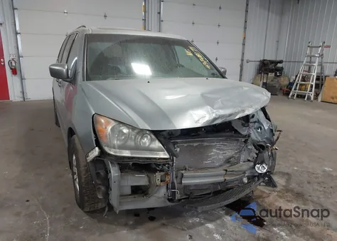 2010 Honda Odyssey Ex-L z USA, uszkodzony, nr VIN 5FNRL3H77AB107616